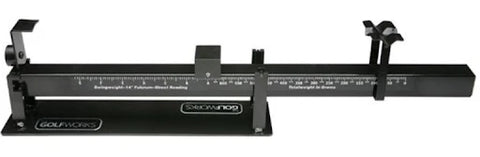 Mechanical swingweight scale balancing a golf club at the 14-inch fulcrum